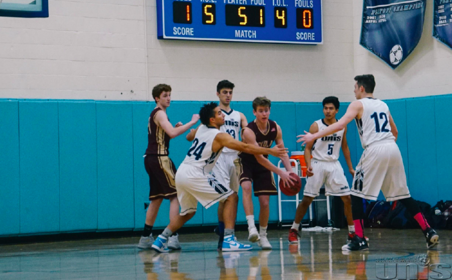 Former UNIS varsity players: Jacob Turner (front left), Preston Gross (back left) and James LaRosa (front right) with Christiano Wennmann (back right).