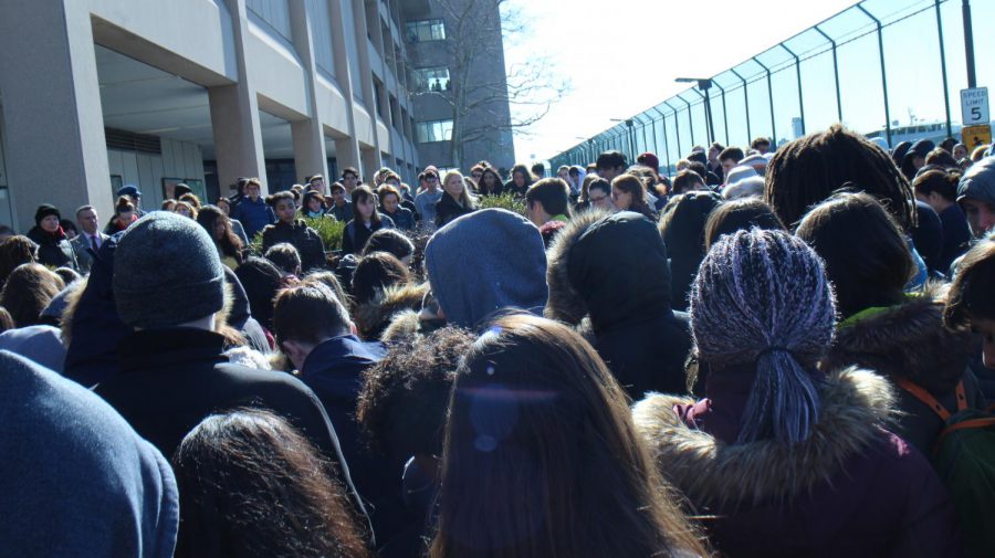 UNIS community having moments of silence during the school walkout. Photo taken by Workneh Getasew.