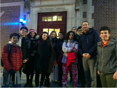 A group photo of ten UNIS participants and Mr. Herman taken by a bypasser.